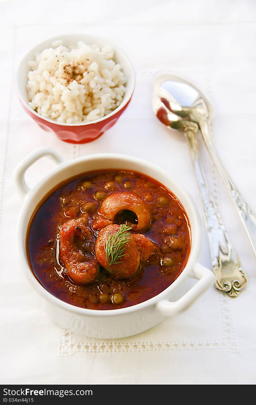 Stewed cuttlefishes and peas and with rice