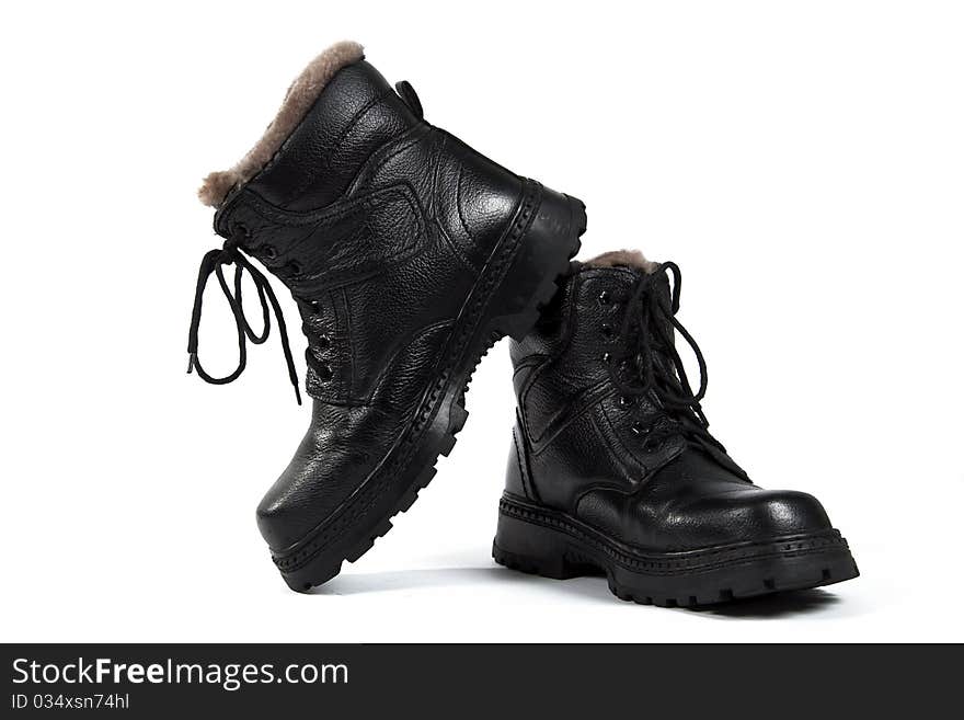 Black man's boots, on the white background, isolated