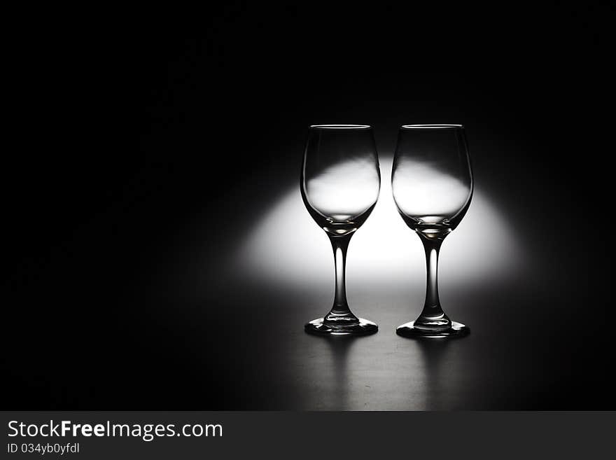 Beautiful couple of glasses with a background like moon. Beautiful couple of glasses with a background like moon