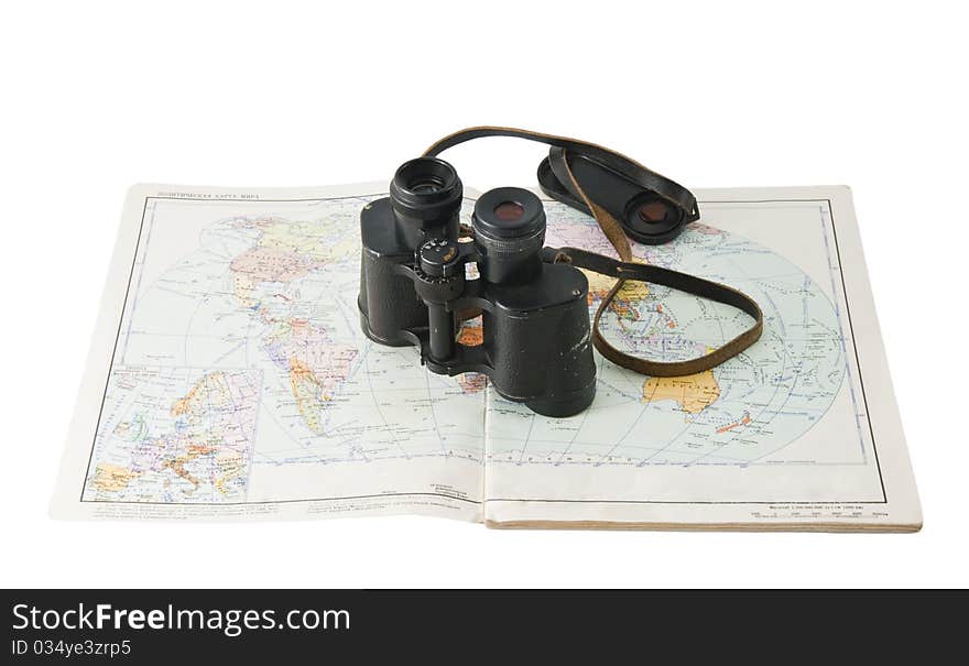 Old commander s binoculars with a map