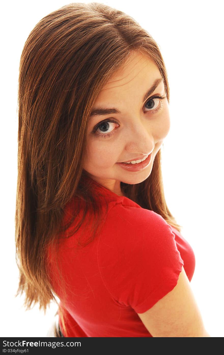 A closeup portrait of an beautiful girl in a red sweater, looking over her shoulder smiling, on white background. A closeup portrait of an beautiful girl in a red sweater, looking over her shoulder smiling, on white background.