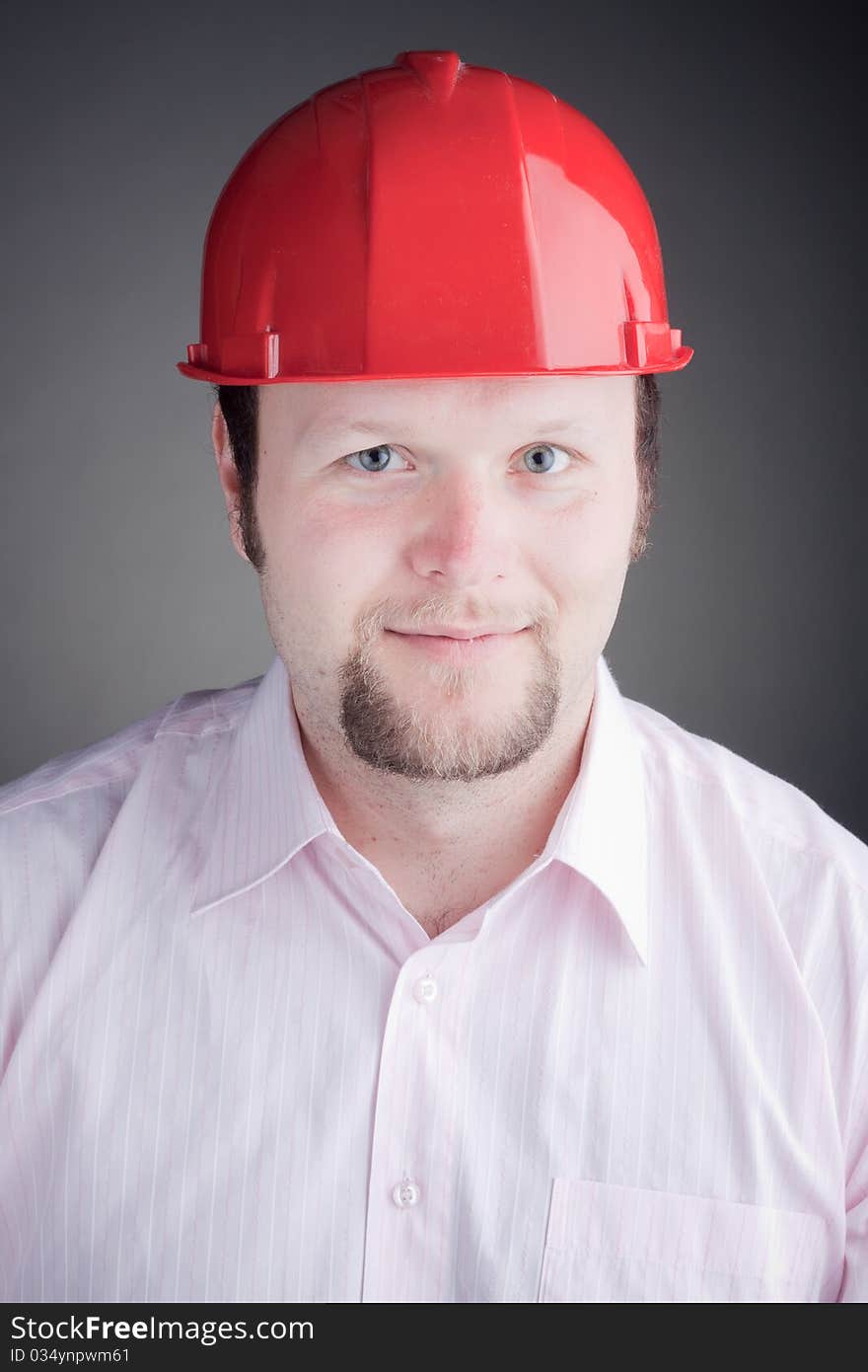 Photo of handsome engineer smiling