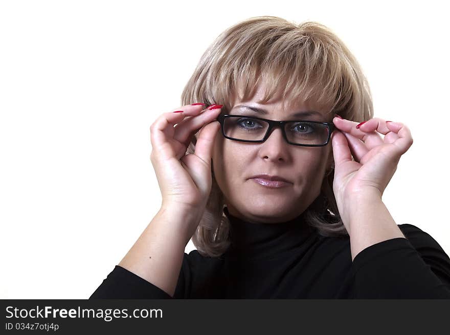 Portrait of the attentive blonde wearing spectacles. Portrait of the attentive blonde wearing spectacles