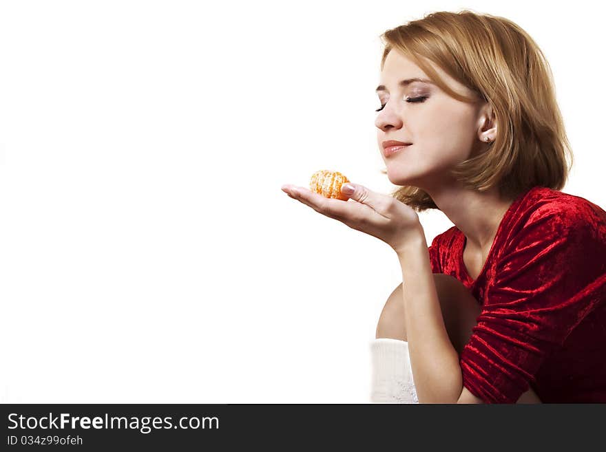 Girl with mandarin in her hand