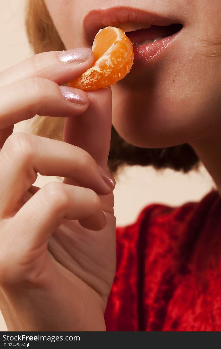 Girl Eating Mandarin