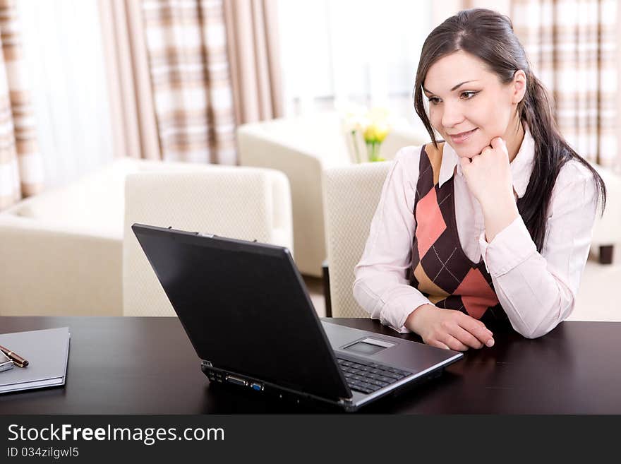 Young adult businesswoman at home