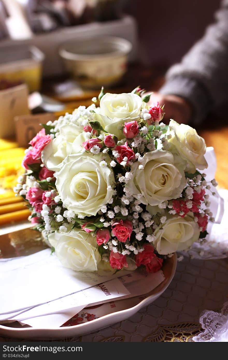 Bridal bouquet on the table in the church. Bridal bouquet on the table in the church