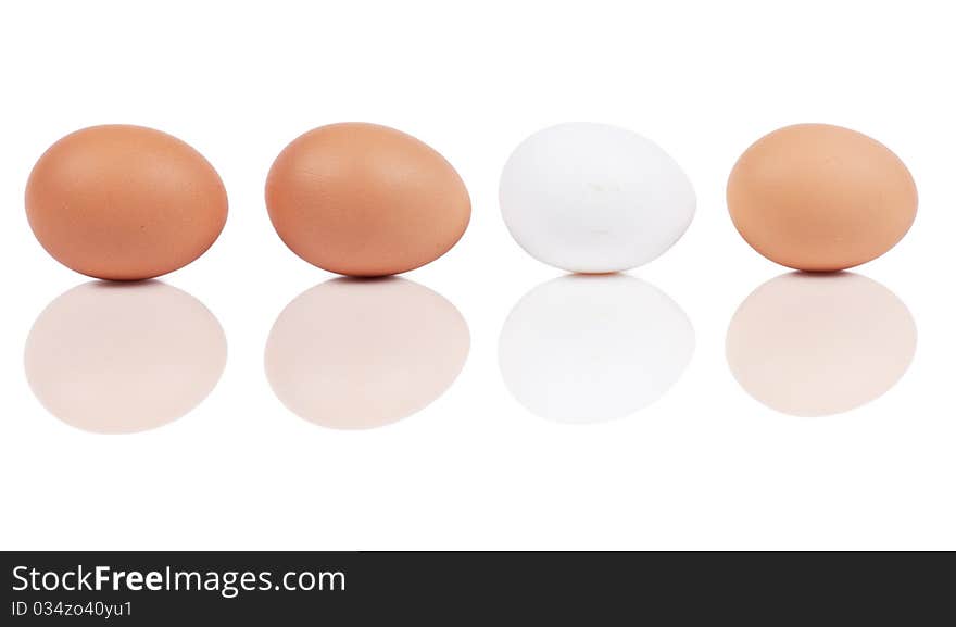 Macro view of four eggs isolated on the white