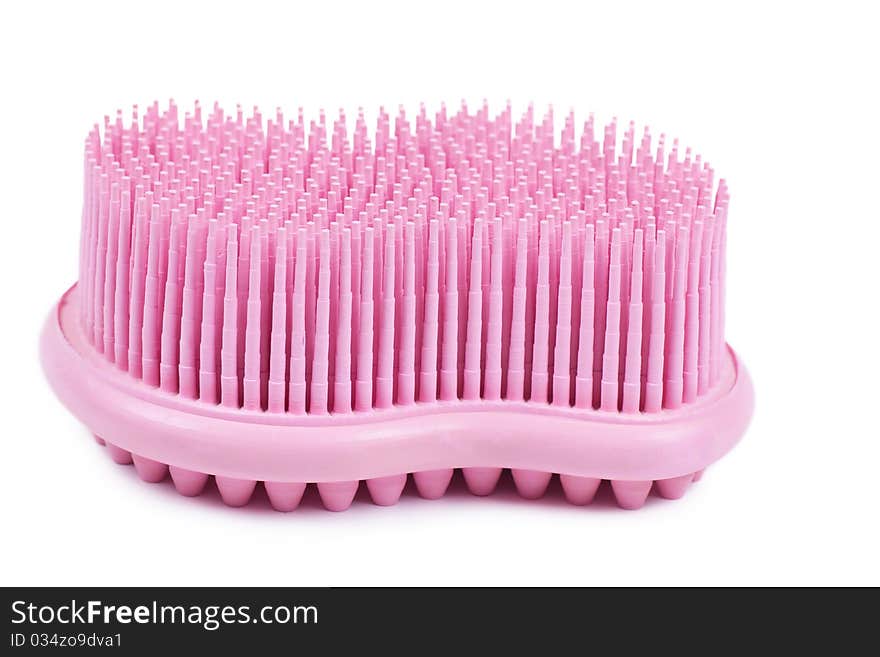 Closeup view of pink rubber sponge isolated on the white