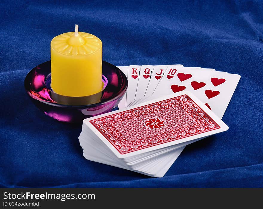 Playing Cards And Candle