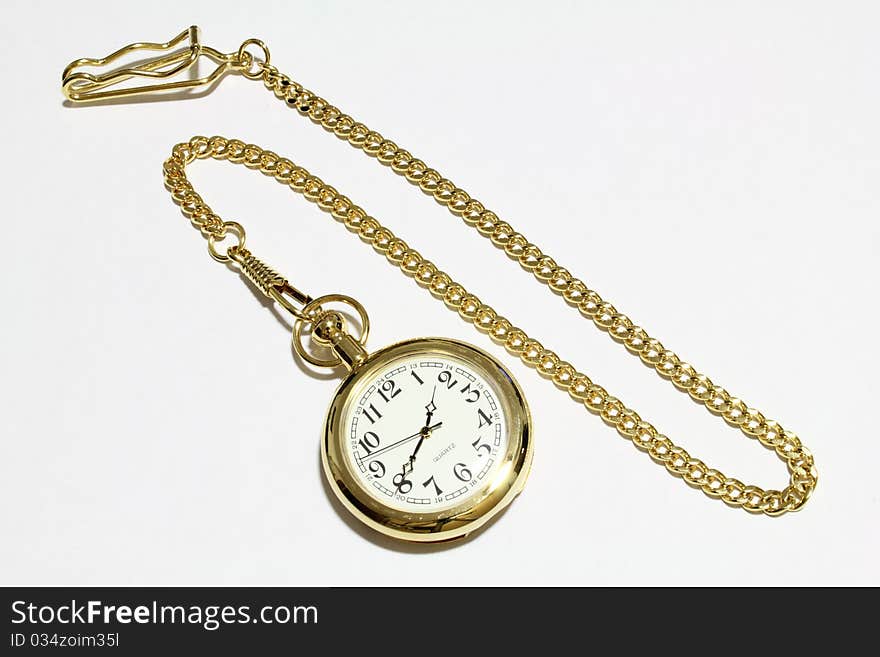 A nice gold clock on white background