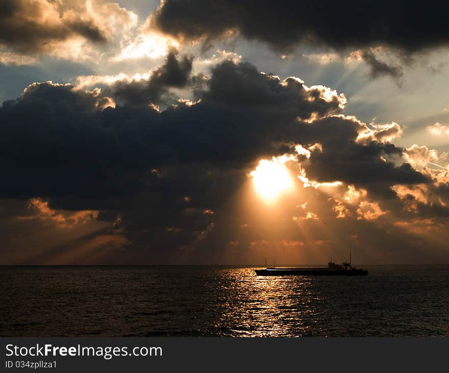 Ship and sunrise over sea. Ship and sunrise over sea.