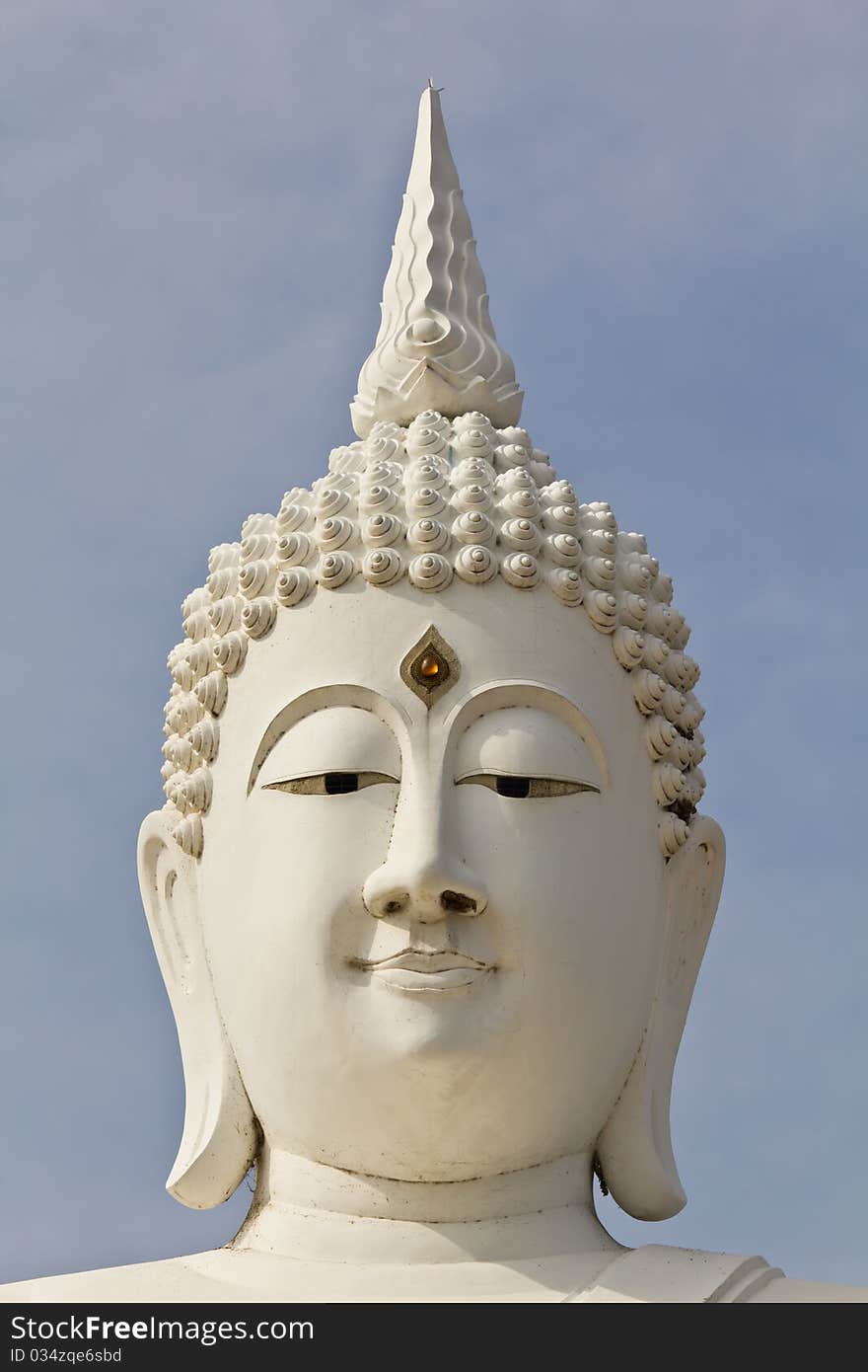 White face buddha image in temple Thailand