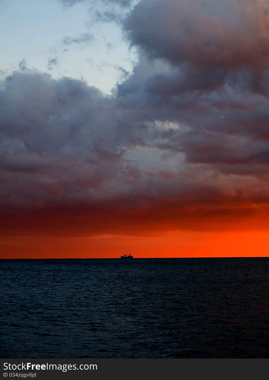 Ship and sunset over sea. Ship and sunset over sea.