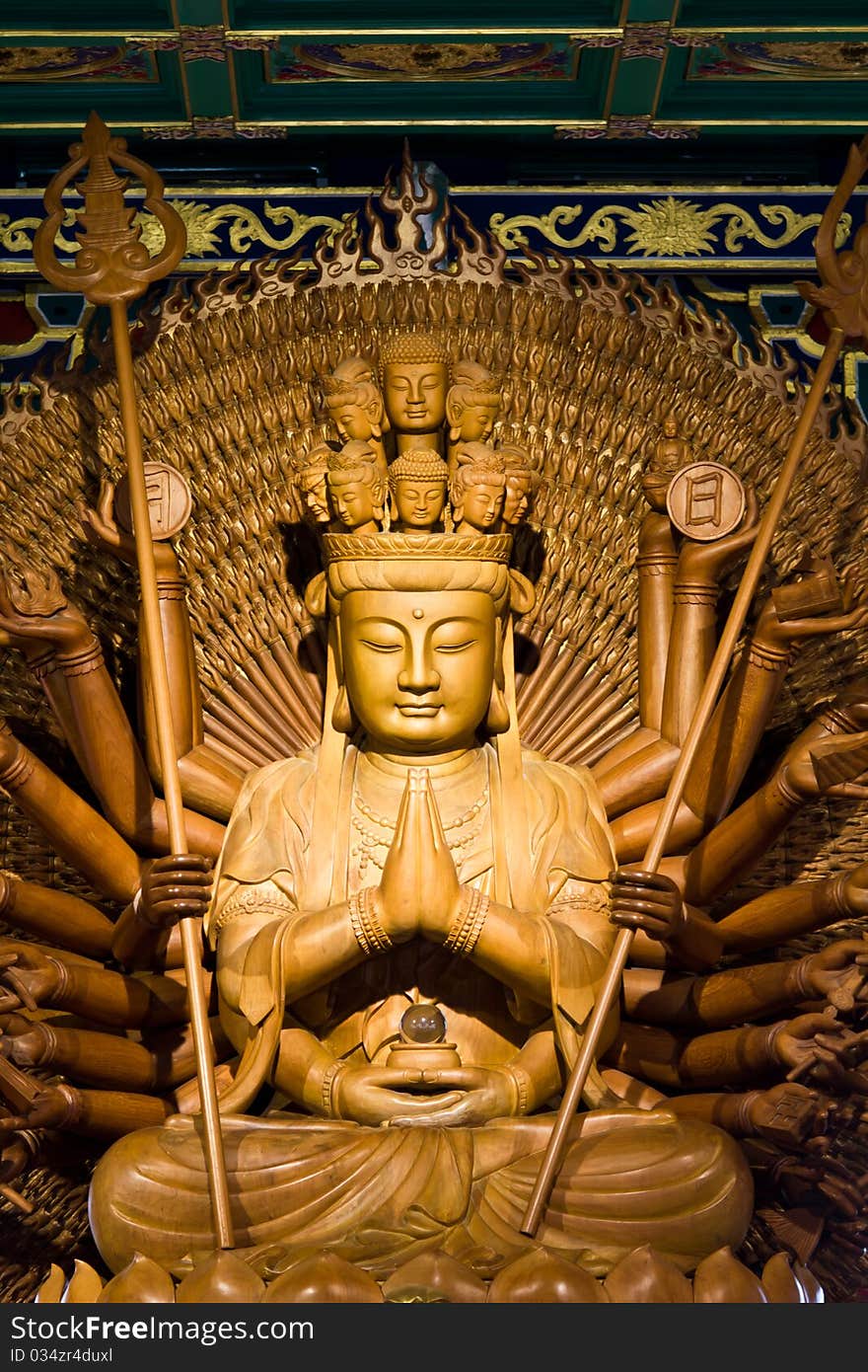 Thousand hands of god image make of wood carving chinese art in thailand