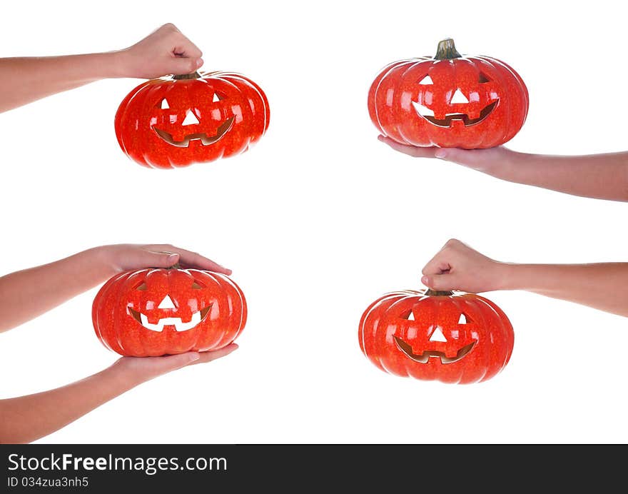 Halloween Pumpkin In A Female Hand, Isolated