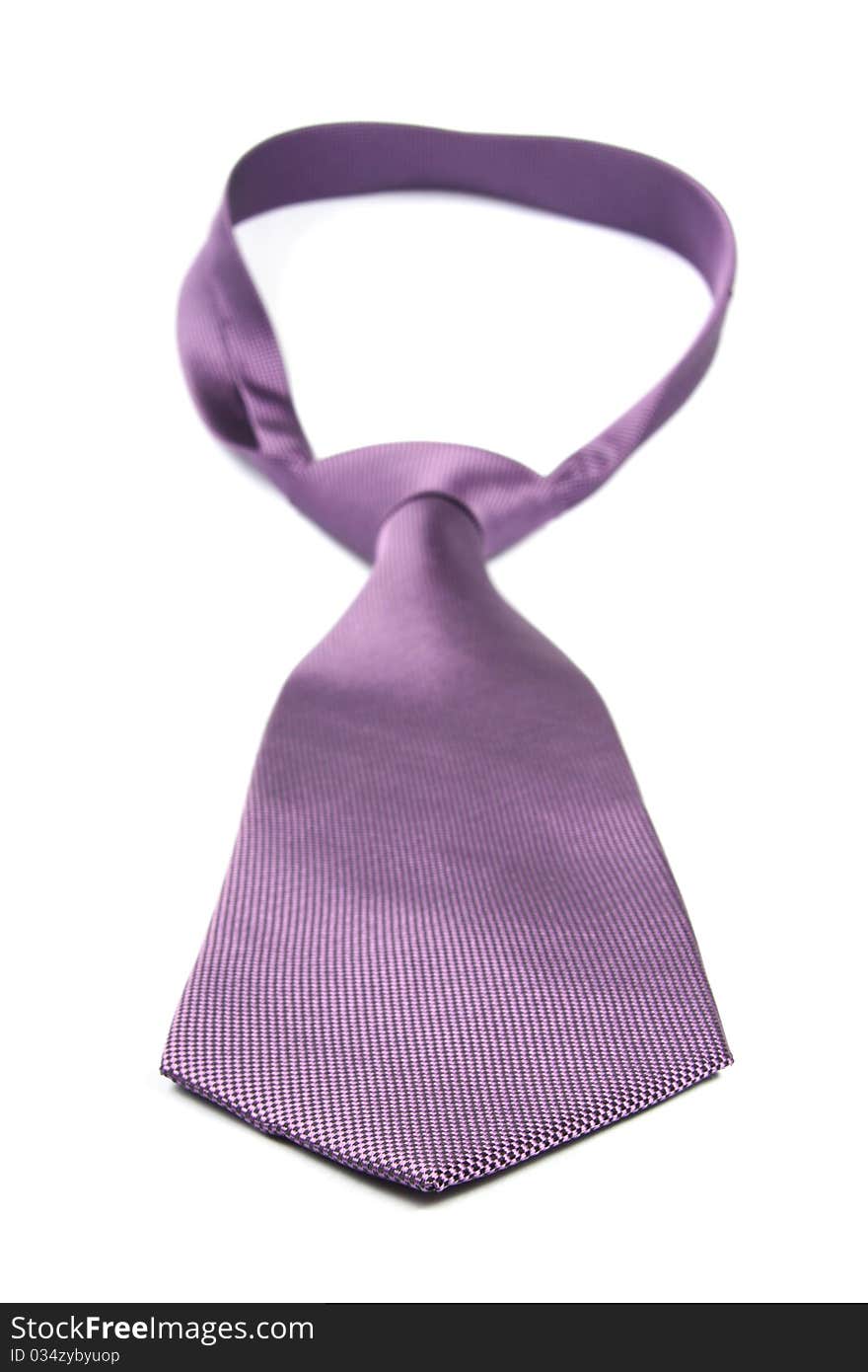 Purple neck tie isolated on white background