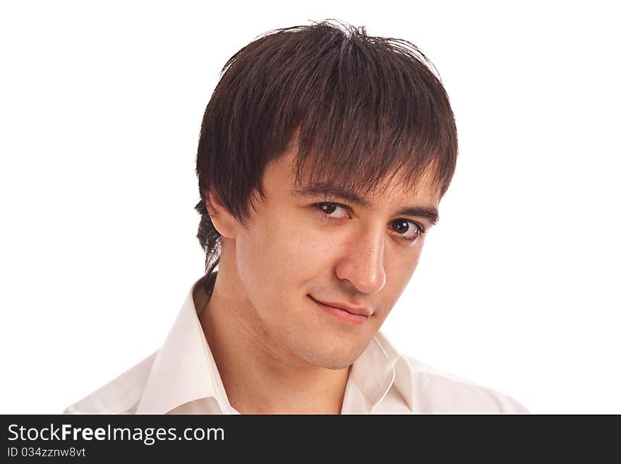 Portrait serious guy in a white shirt isolated. Portrait serious guy in a white shirt isolated