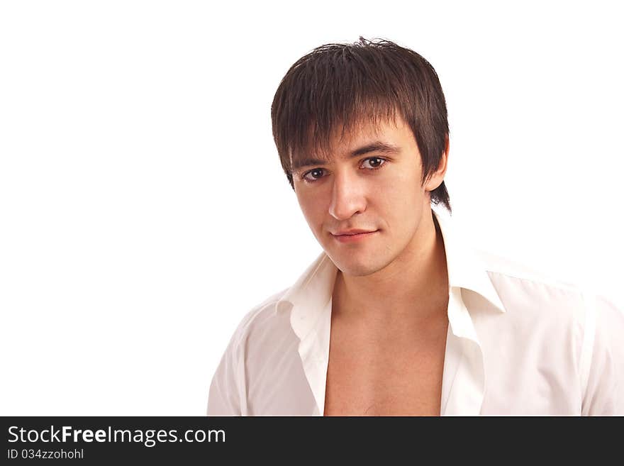 Portrait serious guy in a white shirt isolated. Portrait serious guy in a white shirt isolated