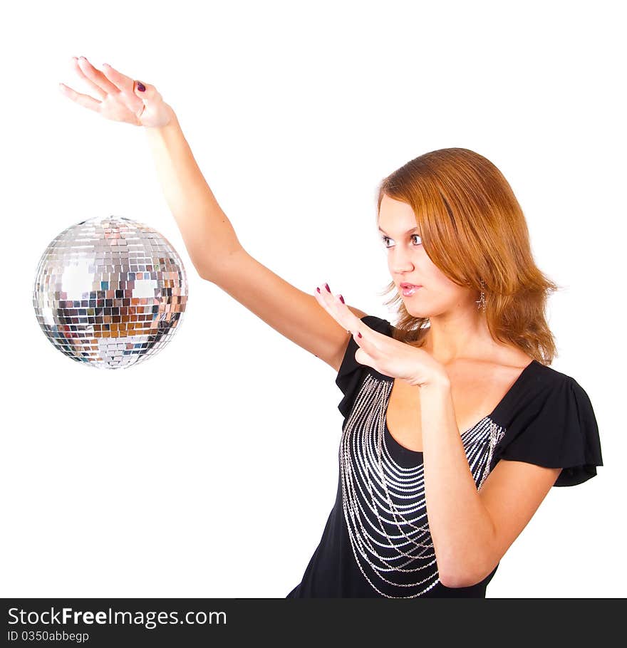 Woman makes magical passes over the mirror-ball. Woman makes magical passes over the mirror-ball