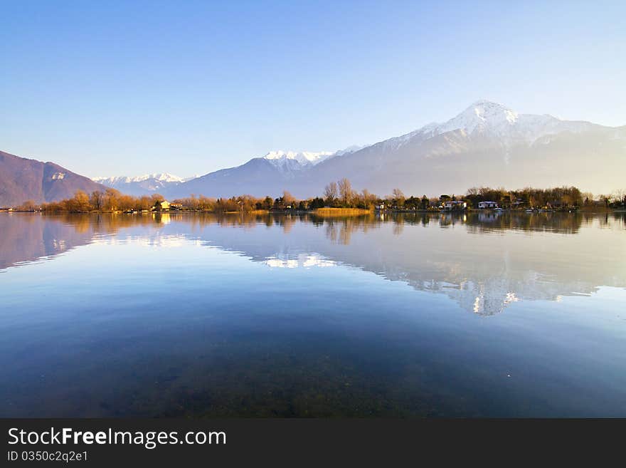 Lake with trees and grass on the banks