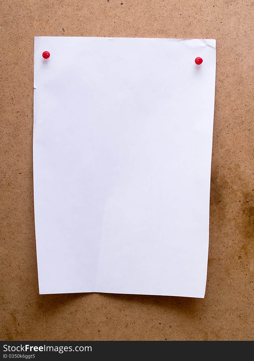 White note paper on wood background. White note paper on wood background