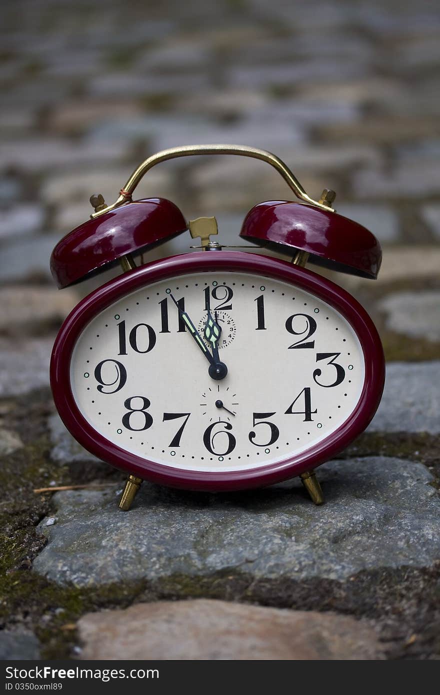 Clock on a cobblestone