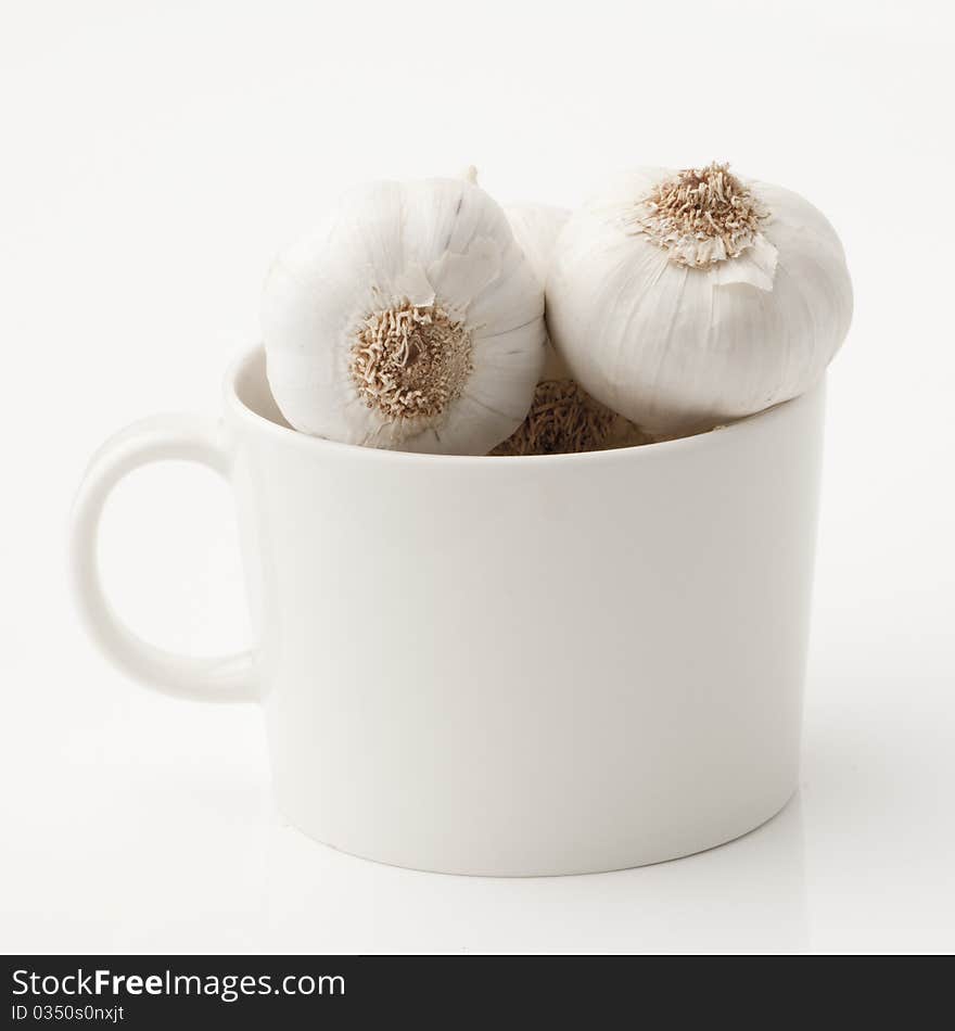 Still life of garlics isolated on a white background.