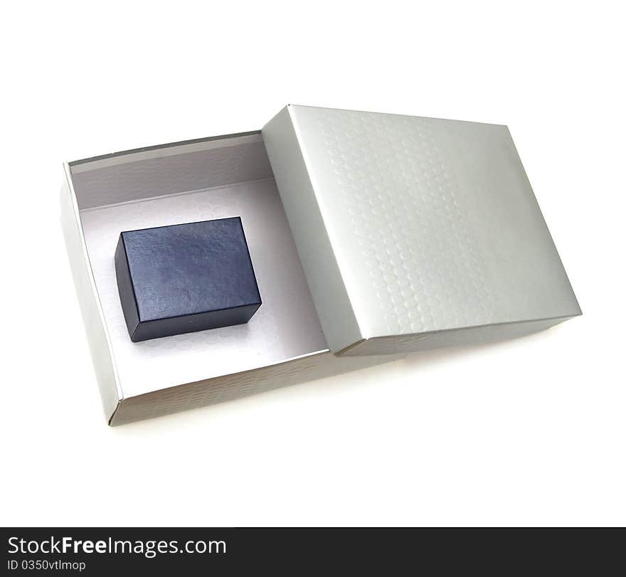 Silver gift-box on white background, with silver ribbon. Silver gift-box on white background, with silver ribbon