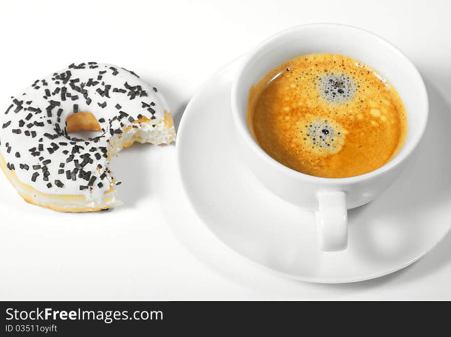 Donut with cup of coffee on white background