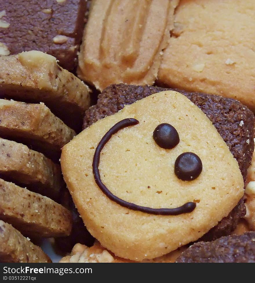 Smiling Cookies - in beige Background Resources. Smiling Cookies - in beige Background Resources