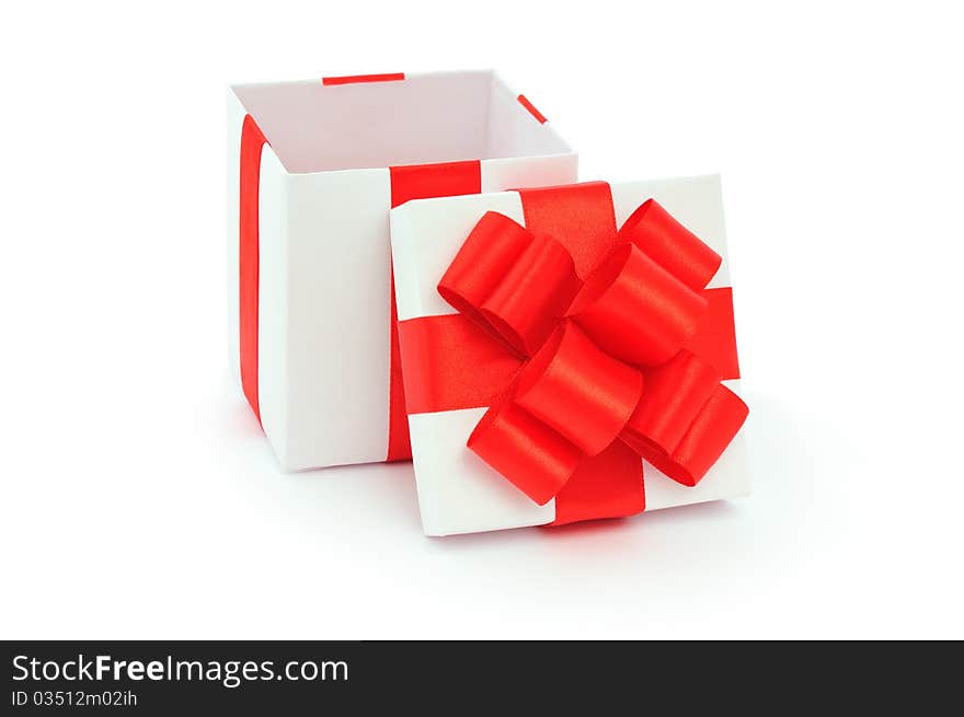 Open empty gift box and red bow. Isolated. Open empty gift box and red bow. Isolated.