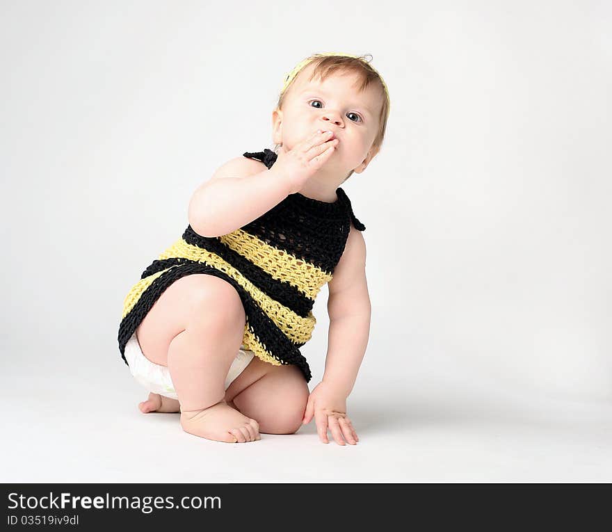 Cute baby kissing its hand