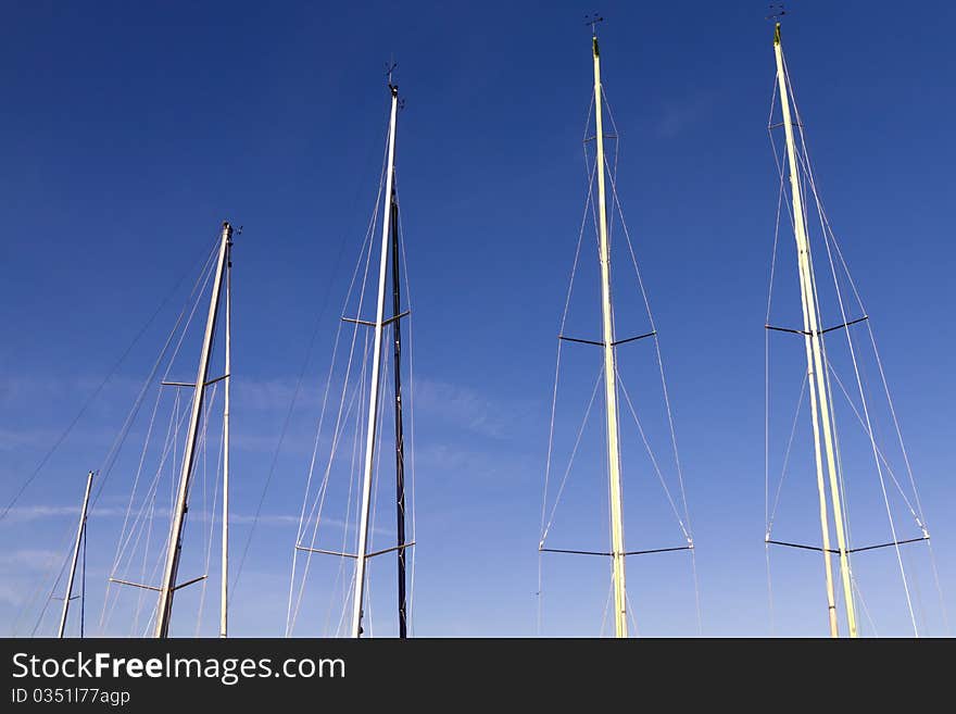 Yards at harbor with blue sky