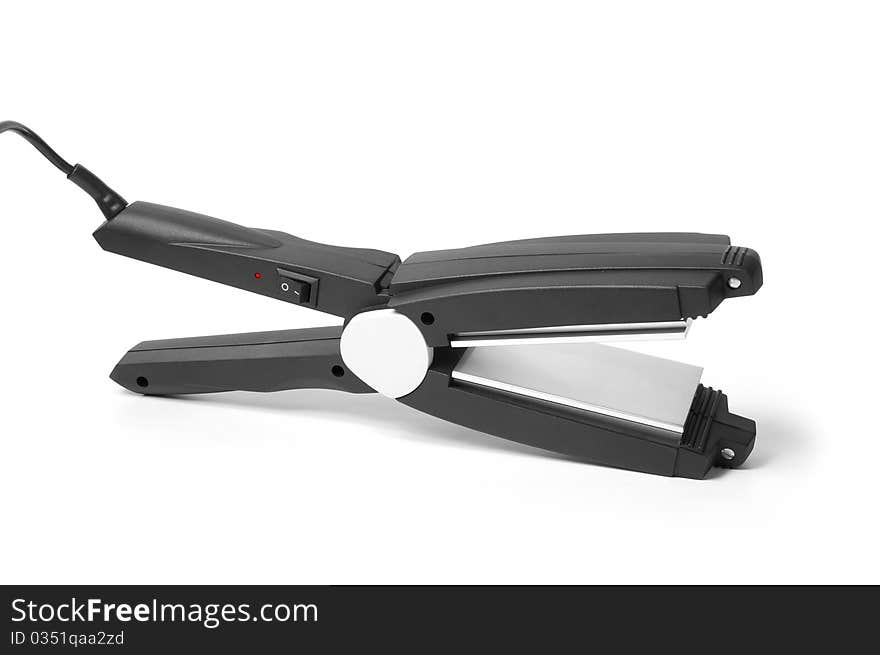 Iron hair straightener on a white background