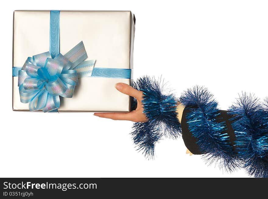 Woman giving a silver box with blue bow as a gift for christmas. Woman giving a silver box with blue bow as a gift for christmas