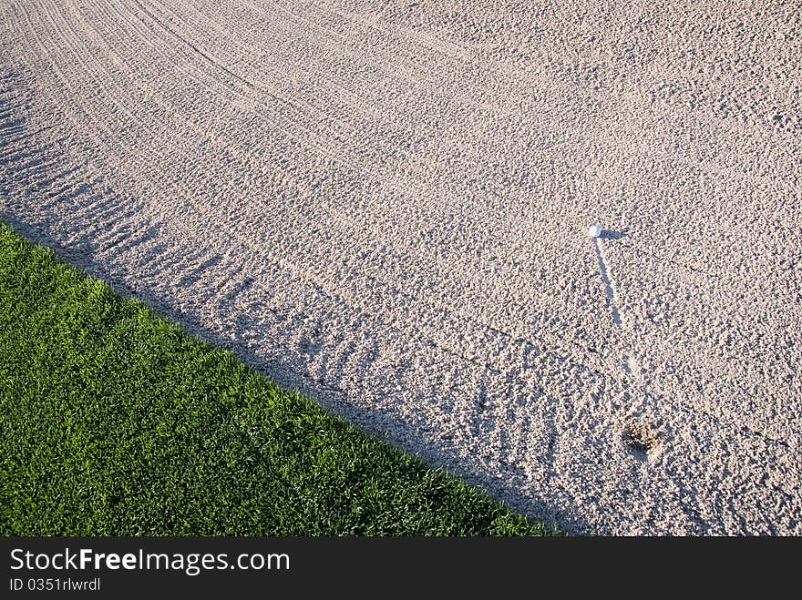 Golf Ball In Sand Trap