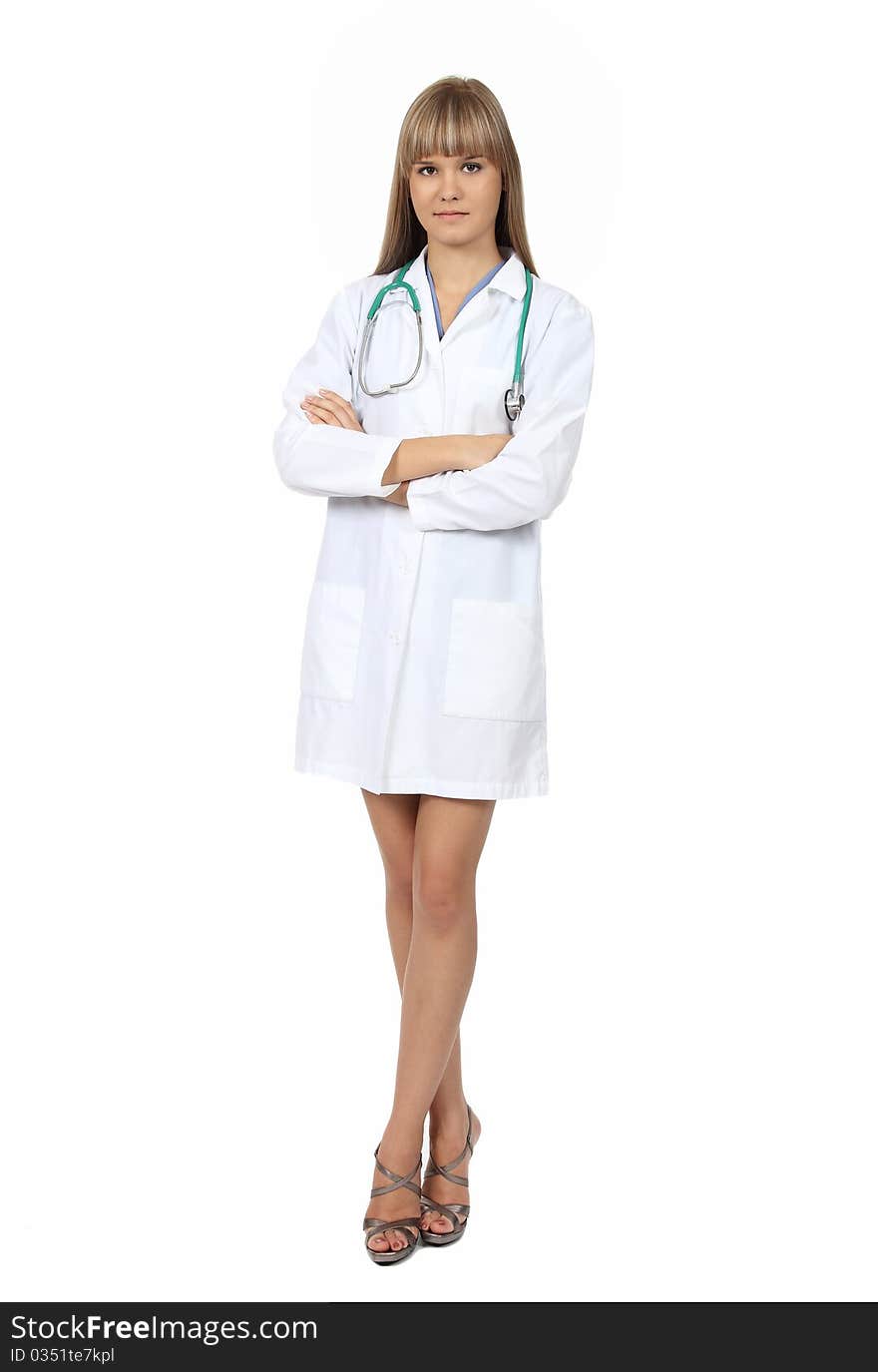 Pretty female doctor with stethoscope isolated on white background