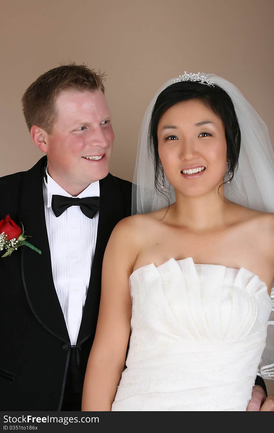 Beautiful couple on their wedding day in traditional attire. Beautiful couple on their wedding day in traditional attire