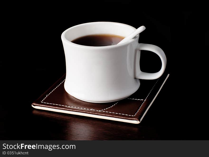 A cup of tea on the table. Studio shot. A cup of tea on the table. Studio shot.