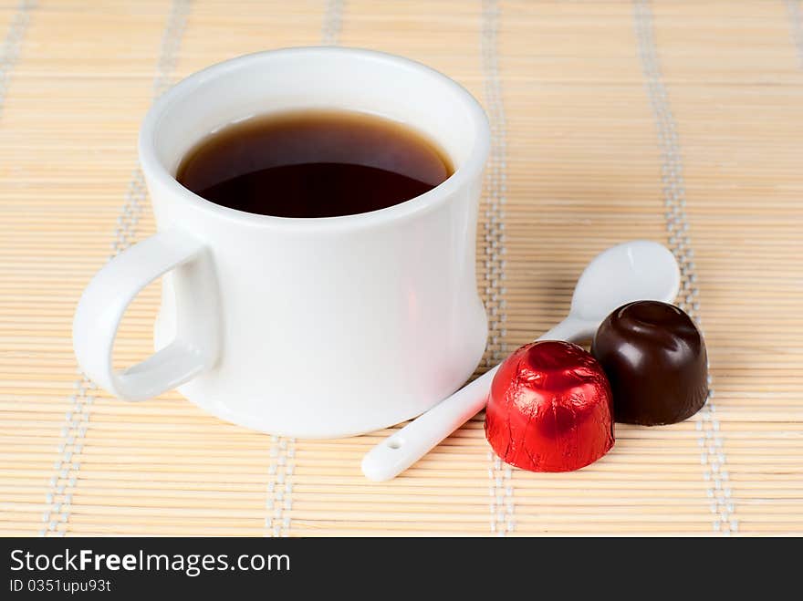 A Cup Of Tea With Sweets.