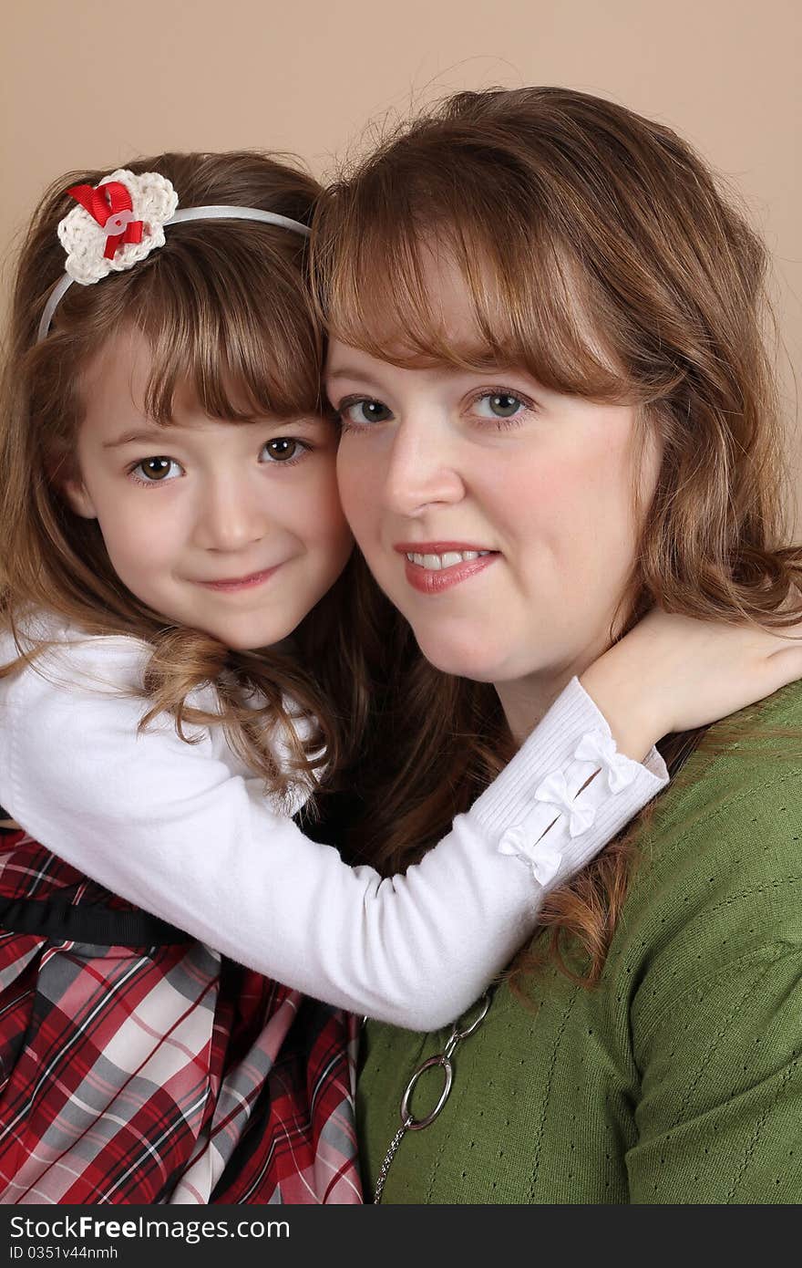 Portrait of a beautiful girl and her mother. Portrait of a beautiful girl and her mother