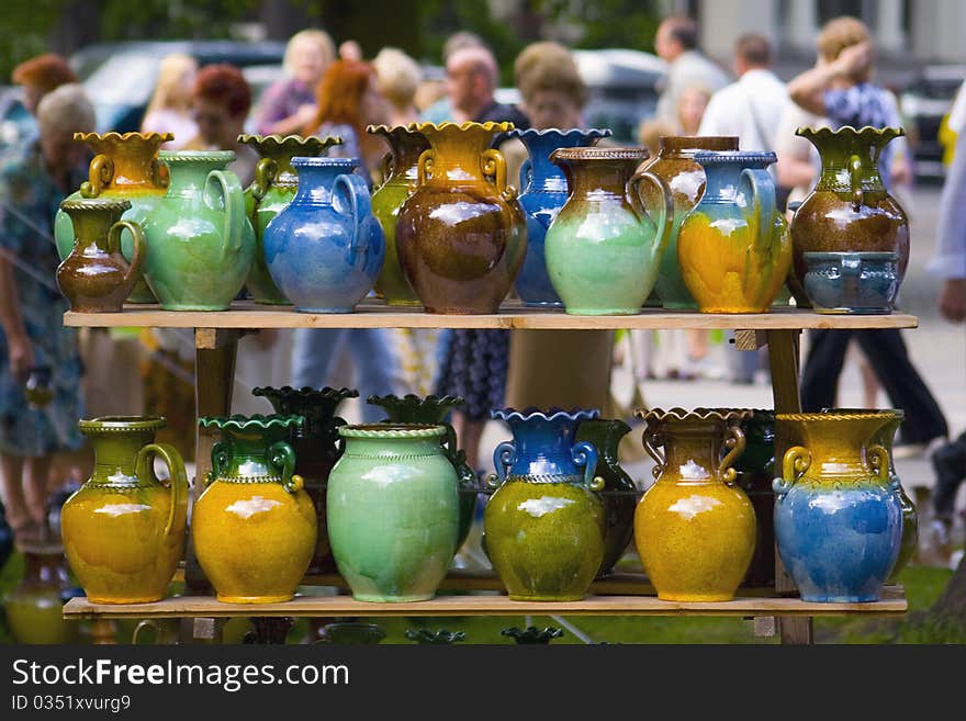 Clay mugs for sale in a summer fair