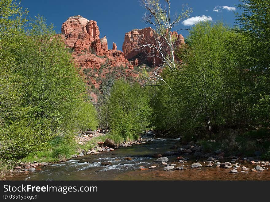 Cathedral Rock towers above the waters of Oak Creek near Sedona, Arizona. Cathedral Rock towers above the waters of Oak Creek near Sedona, Arizona