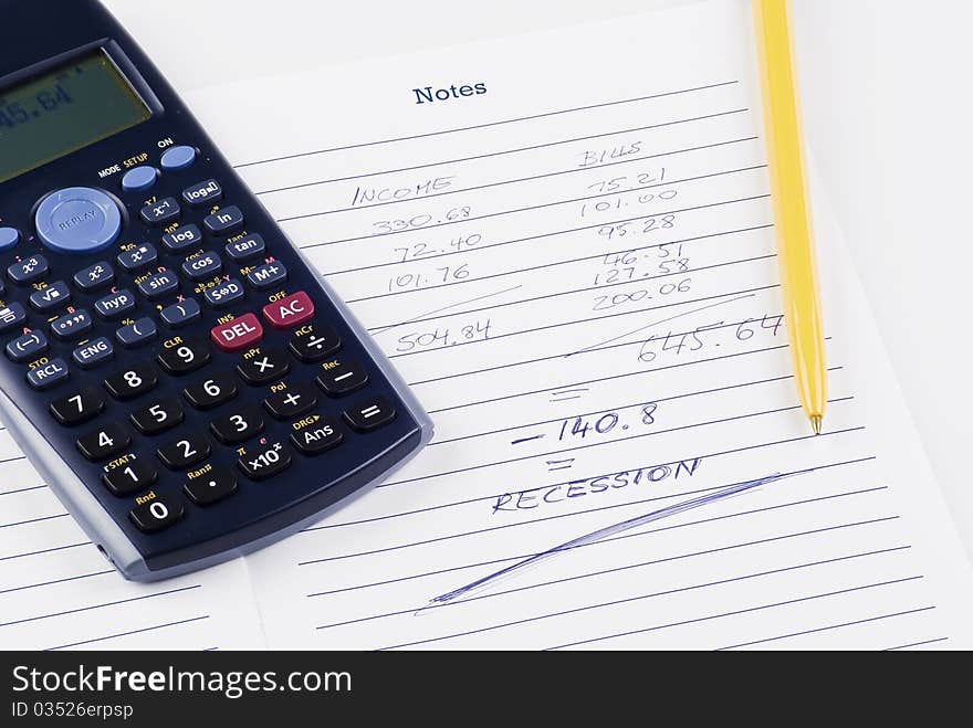 Calculator with notebook and pen - calculations. Calculator with notebook and pen - calculations