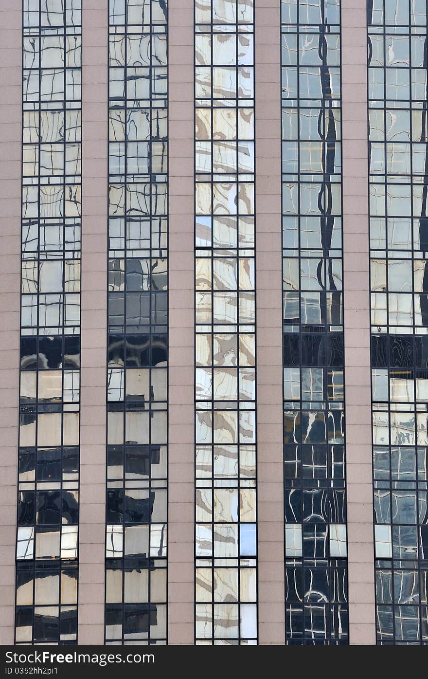 Glass wall reflection of building