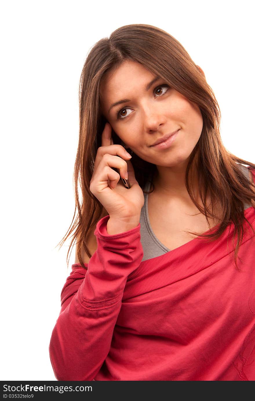 Pretty young woman talking on new cell phone mobile isolated on a white background. Pretty young woman talking on new cell phone mobile isolated on a white background