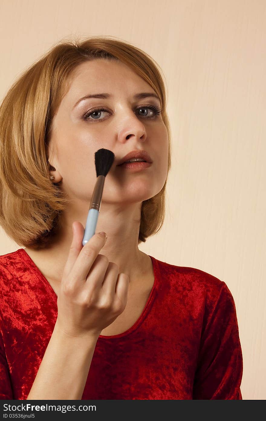 Portrait Of The Girl With A Brush For Make-up