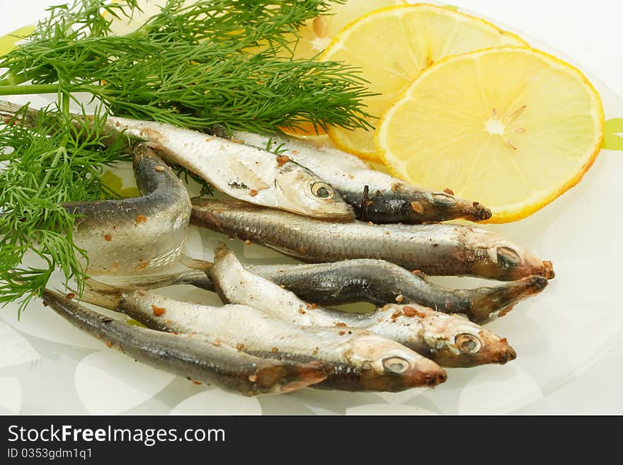 Salted sprats with lemon and dill