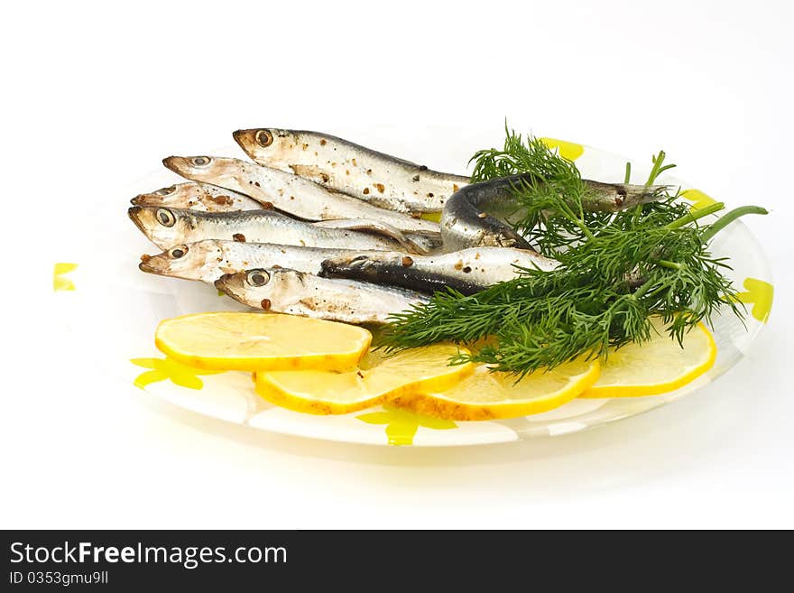 Salted sprats with lemon and dill